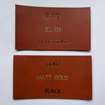 Load image into Gallery viewer, 2 Personalised Gold Marbled Leather Napkin Rings
