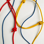 Load image into Gallery viewer, Handmade Leather Phone Carrier With Coloured Strap
